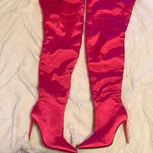 Pink thigh high heeled boots